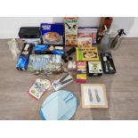 A lot of boxed kitchenware including teapot set,chopping boards,scales, cutlery set etc