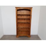 A large five tier bookshelf made from solid pine
