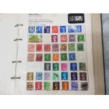Stanley Gibbons Swiftsure stamp album, containing hundreds of stamps from around the world,