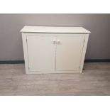 White painted storage cabinet shelved internally with three shelves.two doors to front