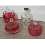 2 cranberry glass covered dishes with clear glass applied handles, a matching basket vase and