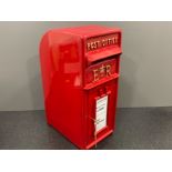 Red metal postbox with keys