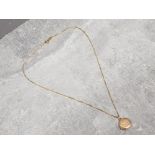 9ct gold locket pendant on 18ct gold chain marked 750, 3.3g gross