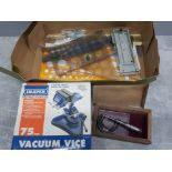 Box containing miscellaneous stencils and boxed Draper 75mm Vacuum Vice