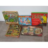 5 boxed vintage boardgames includes Gun Law starring james Arness, the great dragon hunt and