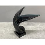 Glass whale tail figure