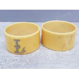Pair of antique ivory napkin rings both etched