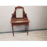 Small Victorian mens dressing table,complete with central drawer in mahogany.leg needs attention.