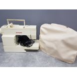 Vintage Singer sewing machine with original carry case