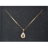 9ct gold sapphire and cz pear shaped pendant with 9ct gold necklace, chain snapped 1.3g gross