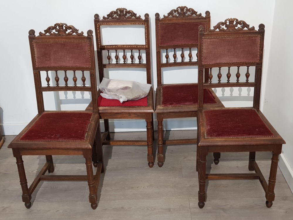 Set of 4 carved oak and metal studded dining chairs, late Victorian/Edwardian