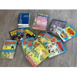 Large lot of books including Beano, soccer world and others