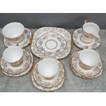 14 pieces of Ashley fine bone china, golden chintz 22K gold