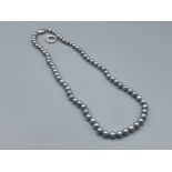 Ladies string of grey cultured pearls