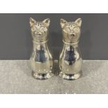 A pair of unusual silver plated cat condiments