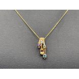 Ladies 9ct gold Stone set pendant and 9ct gold fine chain. Pendant set with oval citrine, round blue