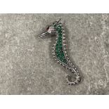 Silver 925 seahorse pendant/brooch set with rubies and green stones