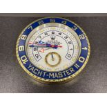 Gold wall clock in the style of Rolex yacht-master