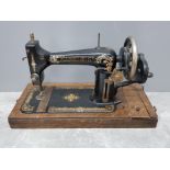 Vintage Harris no 5 sewing machine on oak base