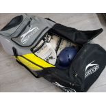 Bag of cricket gear incl protective gear, hats, pads etc plus bats