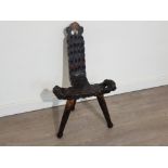 Vintage Heavily carved wooden spinning stool on tripod support