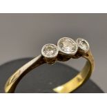 18ct gold, Platinum and diamond 3 stone ring. Size M 2.9g