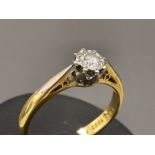 18ct gold, platinum and diamond solitaire ring. 3G size