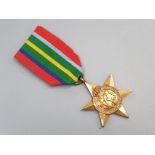 The pacific star british medal, WW2 campaign medal for pacific operations, with ribbon