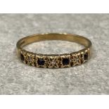 9ct gold sapphire and diamond band. Featuring 4 black sapphires set with diamonds in between. 1.9g