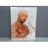 Unframed Marvelous Marvin Hagler picture, signed by the boxing legend along side "god bless all,