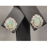Ladies 9ct white gold Opal and diamond stud earrings