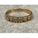 Ladies 9ct gold diamond band. Comprising of 7 round brilliant cut diamonds 1.7g size N