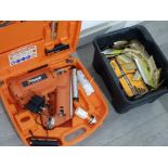 Paslode impulse nail gun in hard case with box of nails, untested