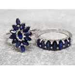 2 silver 925 and blue sapphire rings cluster and 7 stone ring, both size T, combined gross weight