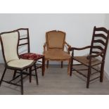 Four mixed chairs includes oak framed ladder back armchair a leather seated metal backed studded