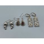 3 pairs of silver earrings including garnet and marcasite