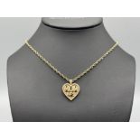 9ct gold Heart shaped MUM pendant and chain. 10.3G