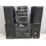 Aiwa stacking system includes tuner, amplifier, cassette deck and speakers together with Amstrad