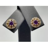 Ladies 9ct gold amethyst and diamond cluster stud earrings