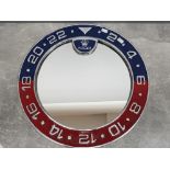 Circular metal framed wall mirror in the style of Rolex Pepsi