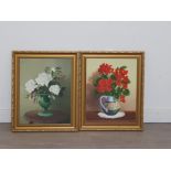 Two oil on board paintings of flowers signed by th.clay