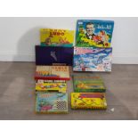 Nine vintage board games includes tidleywinks,snakes and ladders ludo etc