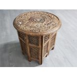 Highly carved asian/eastern Occasional table collapsable with round top