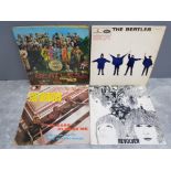 4 Beatles Lp records all with original sleeves includes Revolver, Help, Please please me and Sgt