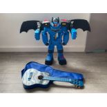 Large child Robot and small acoustic guitar