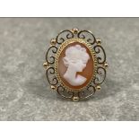 Ladies gold Cameo ring. Comprising of a cameo lady set with ornate scroll edge. 5.5G size N