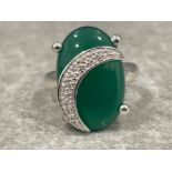Ladies silver and Diamond oval green stone set ring. 8.2g size N1/2