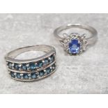 2 silver 925 dress rings with aquamarine type stones includes 14 stone half eternity and cz