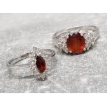 2 silver 925 dress rings with CZs and garnet stones, 7.2g gross