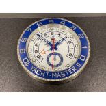 Silver and blue wall clock in the style of Rolex Yacht master II. 34cms